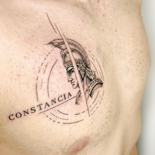 tatuaje de la cara de un romano con la palabra Constancia | tatuajes finos | tatuajes en el pecho | Cornelius Tattoo